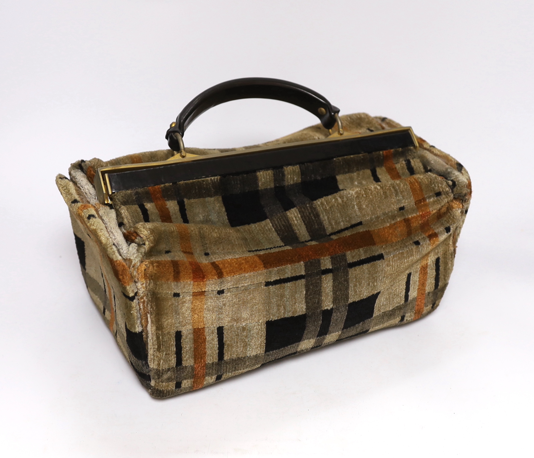 A early 20th century carpet handbag, with geometric moquette, 29cm long